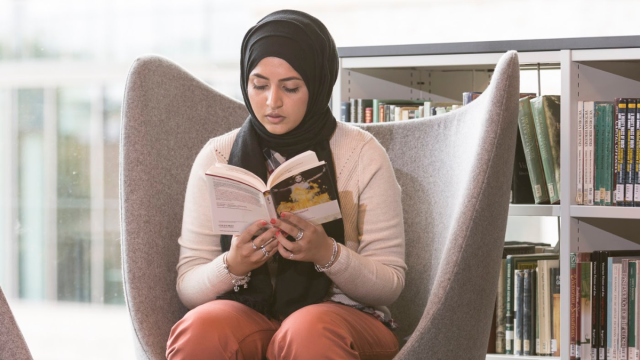 Pakistani students studying at Roehampton University library