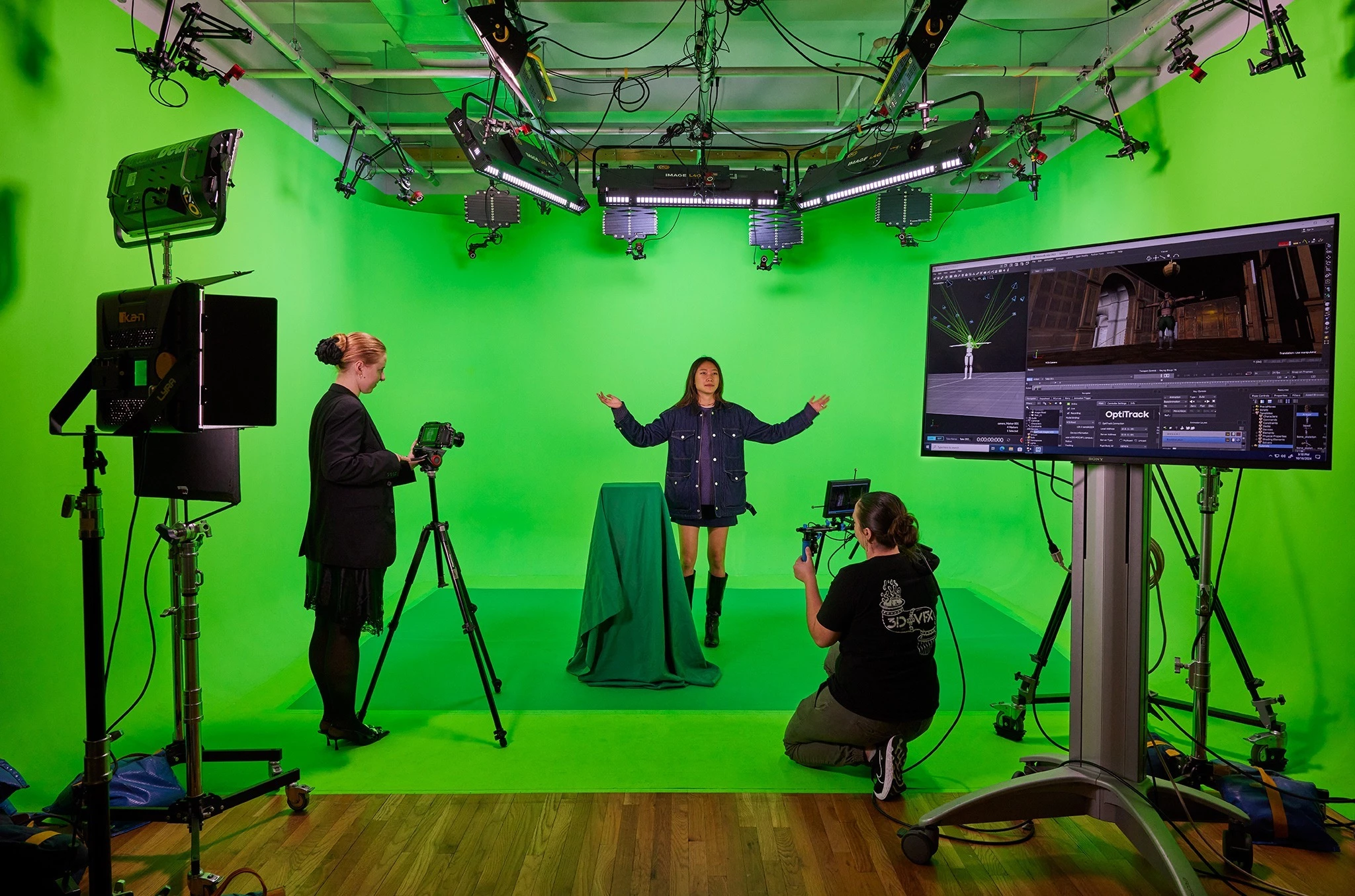 Animation course students working with green screen and film gear